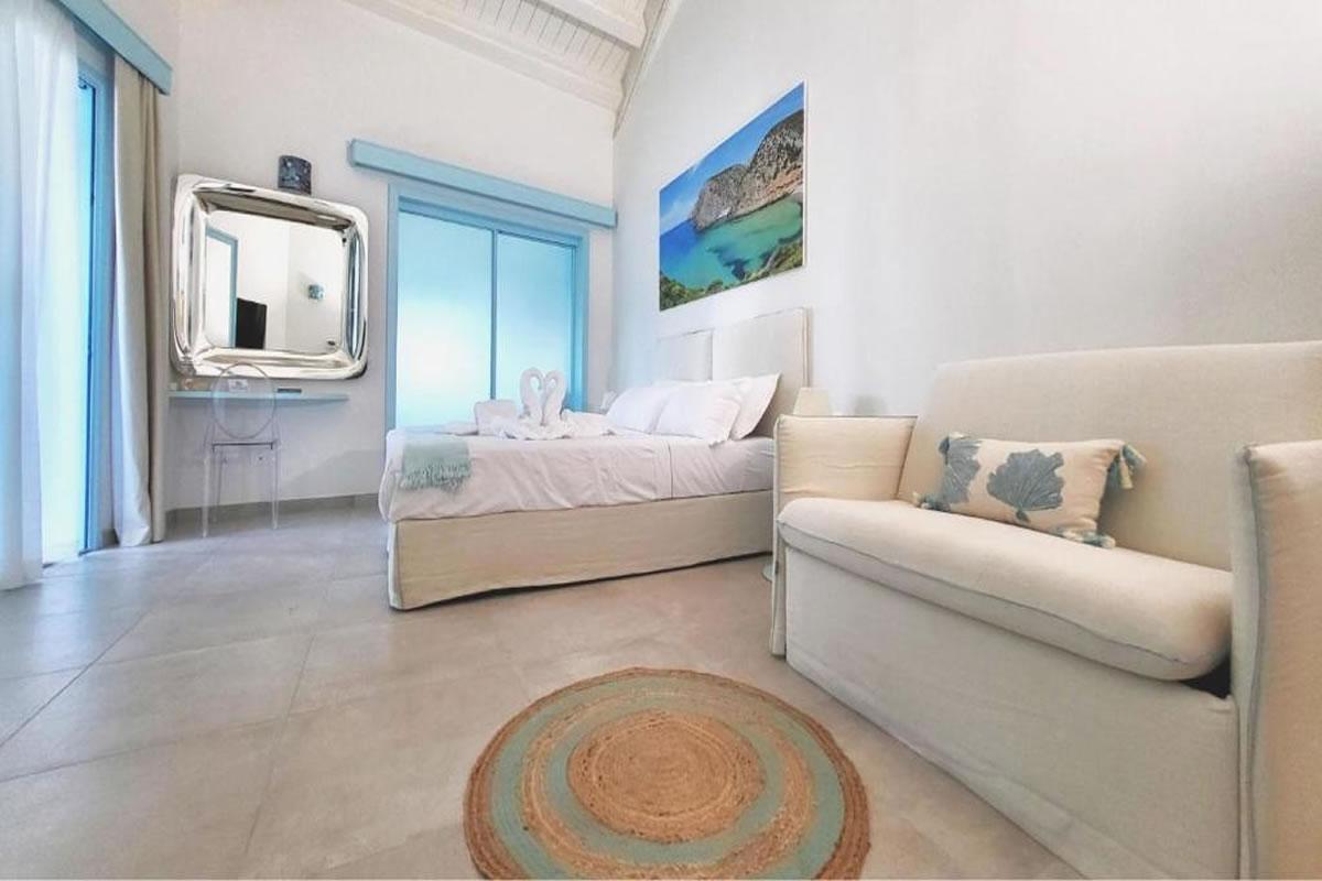 Suite with private jacuzzi and pool view Oasi Blu Sardinia Boutique