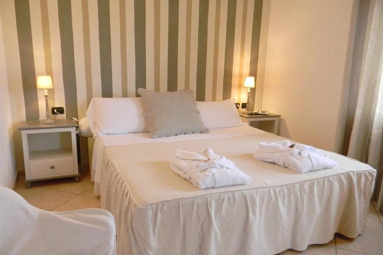 Relais Fenicottero Rosa - Junior Suite, Porto San Paolo (OT)