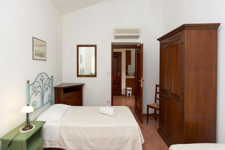 Ferienwohnungen La Tenuta - 3-Zimmer Ferienwohnung Palme / Uva, Alghero (SS)