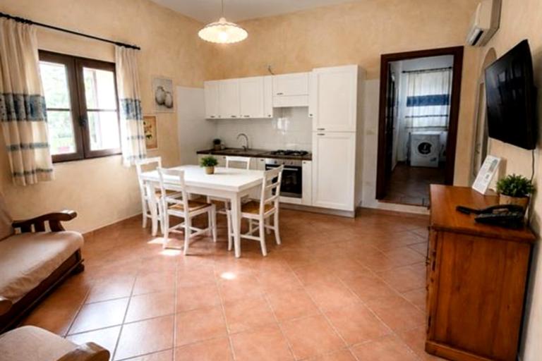 Ferienwohnungen La Tenuta - 3-Zimmer Ferienwohnung Palme / Uva, Alghero (SS)