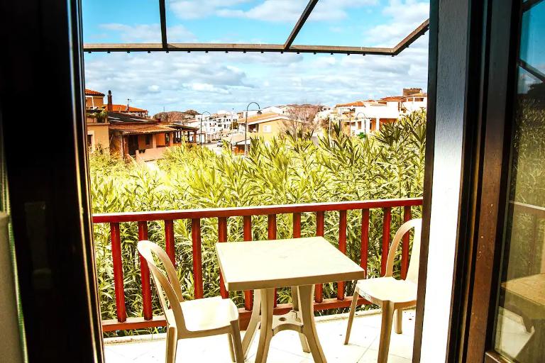 Appartements Isola Rossa - Appartement Junchi, Isola Rossa (OT)
