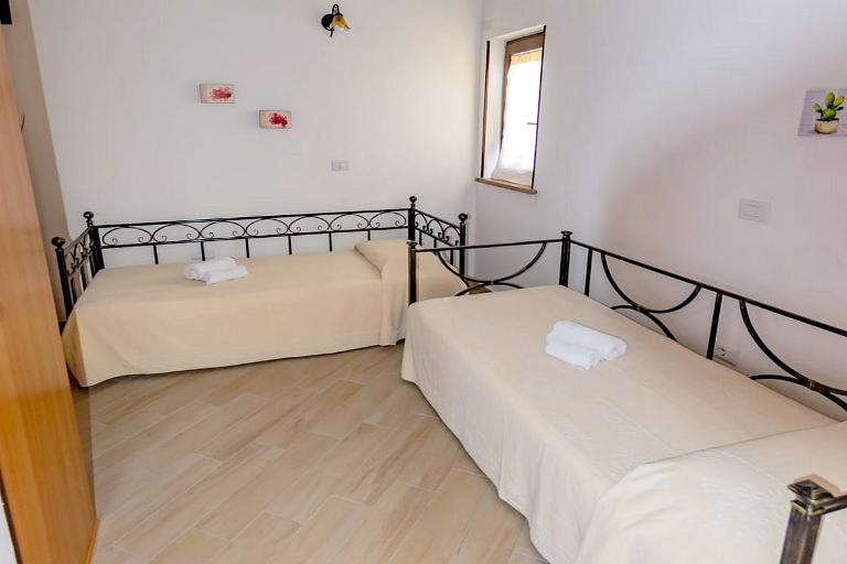 Agriturismo Finagliosu - Camera quadrupla con cucina esterna, Sassari (SS)